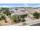 A charming single-story house boasting solar panels, desert landscaping, and a two-car garage at 21104 E Poco Calle --, Queen Creek, AZ 85142