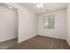 Bright bedroom features a ceiling fan and window with blinds at 22040 N 119Th Dr, Sun City, AZ 85373