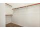Spacious walk-in closet with ample shelving and hanging space at 22040 N 119Th Dr, Sun City, AZ 85373