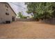 Large, empty backyard with gravel at 2210 N 27Th Pl, Phoenix, AZ 85008
