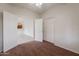 Comfortable bedroom with closet space, featuring carpeted floors and ceiling fan at 2210 N 27Th Pl, Phoenix, AZ 85008