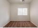 Cozy bedroom with neutral walls, carpeted floors, and a window with blinds at 2210 N 27Th Pl, Phoenix, AZ 85008