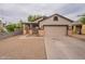 Charming single-Gathering home featuring a two-car garage and covered porch at 2210 N 27Th Pl, Phoenix, AZ 85008