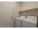 Bright laundry room with modern washer and dryer at 2210 N 27Th Pl, Phoenix, AZ 85008
