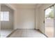 Bright open area featuring tiled flooring, light wall color and access to outdoor area at 2210 N 27Th Pl, Phoenix, AZ 85008