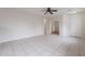 Open living room featuring tiled floors and a ceiling fan at 2210 N 27Th Pl, Phoenix, AZ 85008