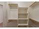 Bright walk-in closet with built-in shelving for optimal storage at 2210 N 27Th Pl, Phoenix, AZ 85008