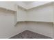 Walk-in closet with a lot of shelf space at 23097 E Camina Buena Vis, Queen Creek, AZ 85142