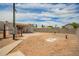 Wide shot of a fenced backyard and covered patio area at 231 N 88Th Way, Mesa, AZ 85207