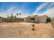 Backyard featuring a covered patio, ample space, and potential for customization at 231 N 88Th Way, Mesa, AZ 85207