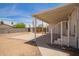 Covered back patio provides shaded area perfect for outdoor seating and entertainment at 231 N 88Th Way, Mesa, AZ 85207