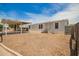 A view of the front yard with desert landscaping and a covered parking area at 231 N 88Th Way, Mesa, AZ 85207