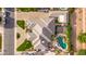 Aerial shot of an luxury property, featuring a custom pool, basketball court, and manicured landscaping at 23465 S 202Nd St, Queen Creek, AZ 85142