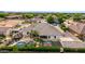 An aerial view of a beautiful single Gathering home with a backyard pool and basketball court at 23465 S 202Nd St, Queen Creek, AZ 85142
