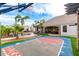 Backyard pool and basketball court with an outdoor seating area at 23465 S 202Nd St, Queen Creek, AZ 85142