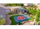 An aerial view of a basketball court with a built-in seating area at 23465 S 202Nd St, Queen Creek, AZ 85142