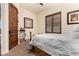 Inviting bedroom with neutral tones, a cozy bed, and plantation shutters at 23465 S 202Nd St, Queen Creek, AZ 85142
