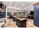 Expansive kitchen featuring a center island, stainless appliances, and an open layout perfect for entertaining at 23465 S 202Nd St, Queen Creek, AZ 85142