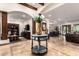 Spacious living room with marble tile floors and stairs leading to the foyer at 23465 S 202Nd St, Queen Creek, AZ 85142