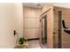 Home dry sauna next to exercise bike with storage in the background at 23465 S 202Nd St, Queen Creek, AZ 85142