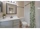 Clean bathroom featuring modern sink, stylish vanity, and a shower with sleek fixtures at 2366 E Spruce Dr, Chandler, AZ 85286