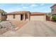 Charming single-story home featuring a well-maintained yard and a spacious two-car garage at 2366 E Spruce Dr, Chandler, AZ 85286