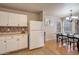 Bright kitchen and dining area with modern appliances and stylish backsplash at 2366 E Spruce Dr, Chandler, AZ 85286