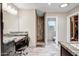 Bathroom featuring dual vanities, a makeup area, a water closet, and a walk-in shower at 2405 E Lynwood Cir, Mesa, AZ 85213