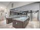 Spacious, renovated kitchen boasting granite countertops, custom cabinets, and stainless appliances at 2405 E Lynwood Cir, Mesa, AZ 85213