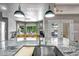 Spacious kitchen featuring granite countertops and a stainless steel sink with views to outdoors at 2405 E Lynwood Cir, Mesa, AZ 85213