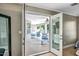 View of the outdoor patio, with a ceiling fan, and furniture, seen from the Primary bedroom at 2405 E Lynwood Cir, Mesa, AZ 85213