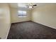 Bedroom with neutral walls and carpeted floor, and a bright, natural window at 2521 N Franz Ln, Casa Grande, AZ 85122