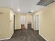 Upstairs hallway leads to a full bathroom and bedrooms with carpet flooring at 2521 N Franz Ln, Casa Grande, AZ 85122