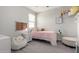 Cozy bedroom featuring soft textures, a stylish beanbag chair and plush toys at 2605 S Quaintance St, Gilbert, AZ 85295