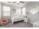 Charming bedroom with a cozy bed, beanbag chair, and decorative heart-shaped mirror at 2605 S Quaintance St, Gilbert, AZ 85295