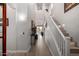 Bright, two-story foyer with wood floors and staircase at 2605 S Quaintance St, Gilbert, AZ 85295