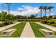 Outdoor community game area with mature trees, seating, sidewalks, and recreational space at 2605 S Quaintance St, Gilbert, AZ 85295