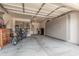 Organized garage with storage cabinets and wall-mounted racks for bikes, offering a functional and tidy space at 2605 S Quaintance St, Gilbert, AZ 85295