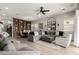 Open-concept living space with combined living and dining areas and stylish contemporary furnishings at 2605 S Quaintance St, Gilbert, AZ 85295
