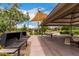 Community picnic area with grills, tables, playground, and shady shelter for gatherings at 2605 S Quaintance St, Gilbert, AZ 85295