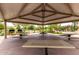 Covered picnic area with tables and grills provides a space for outdoor gatherings at 2605 S Quaintance St, Gilbert, AZ 85295