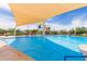 Community pool featuring a shaded splash area with slides, and plenty of room for swimming laps at 2605 S Quaintance St, Gilbert, AZ 85295