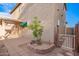 Backyard featuring a patio, decorative landscaping, and mature tree that adds a touch of nature at 2652 E Riviera Dr, Chandler, AZ 85249