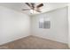Bright bedroom with carpeted flooring and a window providing natural light at 2652 E Riviera Dr, Chandler, AZ 85249