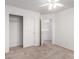 Bedroom featuring carpeted flooring and a large closet for storage at 2652 E Riviera Dr, Chandler, AZ 85249