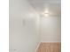 Neutral room features wood-look floors and white paint at 2652 E Riviera Dr, Chandler, AZ 85249