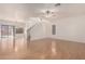 Bright living area with hardwood floors, staircase, and sliding glass doors at 2652 E Riviera Dr, Chandler, AZ 85249