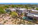 Desert home with a backyard pool, landscaping, and patio at 27892 N 108Th Way, Scottsdale, AZ 85262