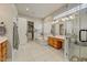 Elegant primary bathroom with a soaking tub, spacious shower, and -and- vanity at 27892 N 108Th Way, Scottsdale, AZ 85262