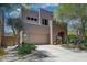 Contemporary two-story home featuring desert landscaping, attached garage, and neutral color palette at 27892 N 108Th Way, Scottsdale, AZ 85262